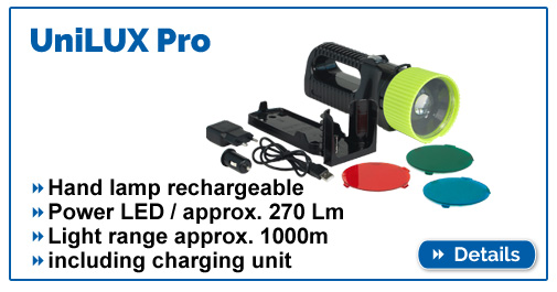 Battery handheld spotlight with 1000m beam range, charging station and accessories.